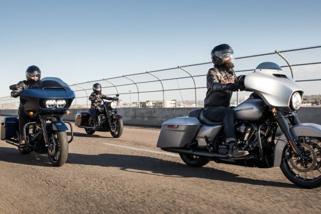 Three riders on touring motorcycles