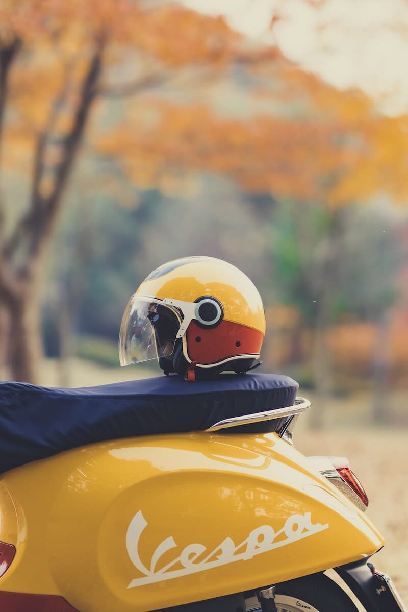 Yellow Vespa and Matching Helmet